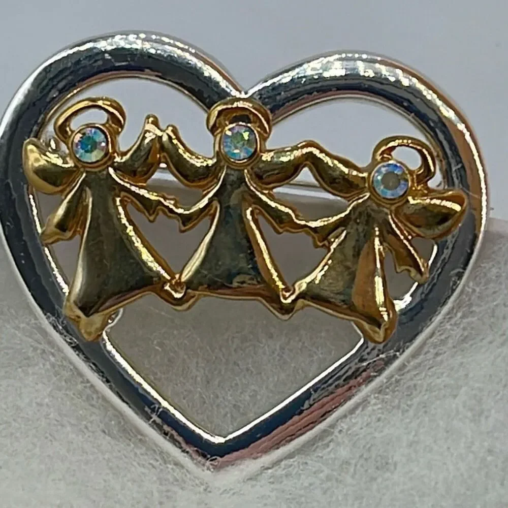 Vintage heart Angel trio Aura Borealis brooch.